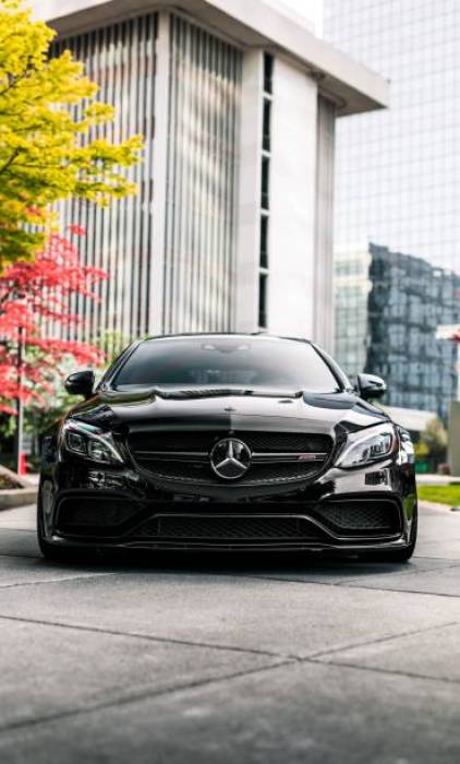 Seattle, WA, USA
8/11/2022
Black Mercedes Benz C63 S driving on the road